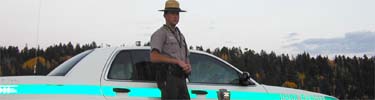 Ranger Moore with patrol car on rim
